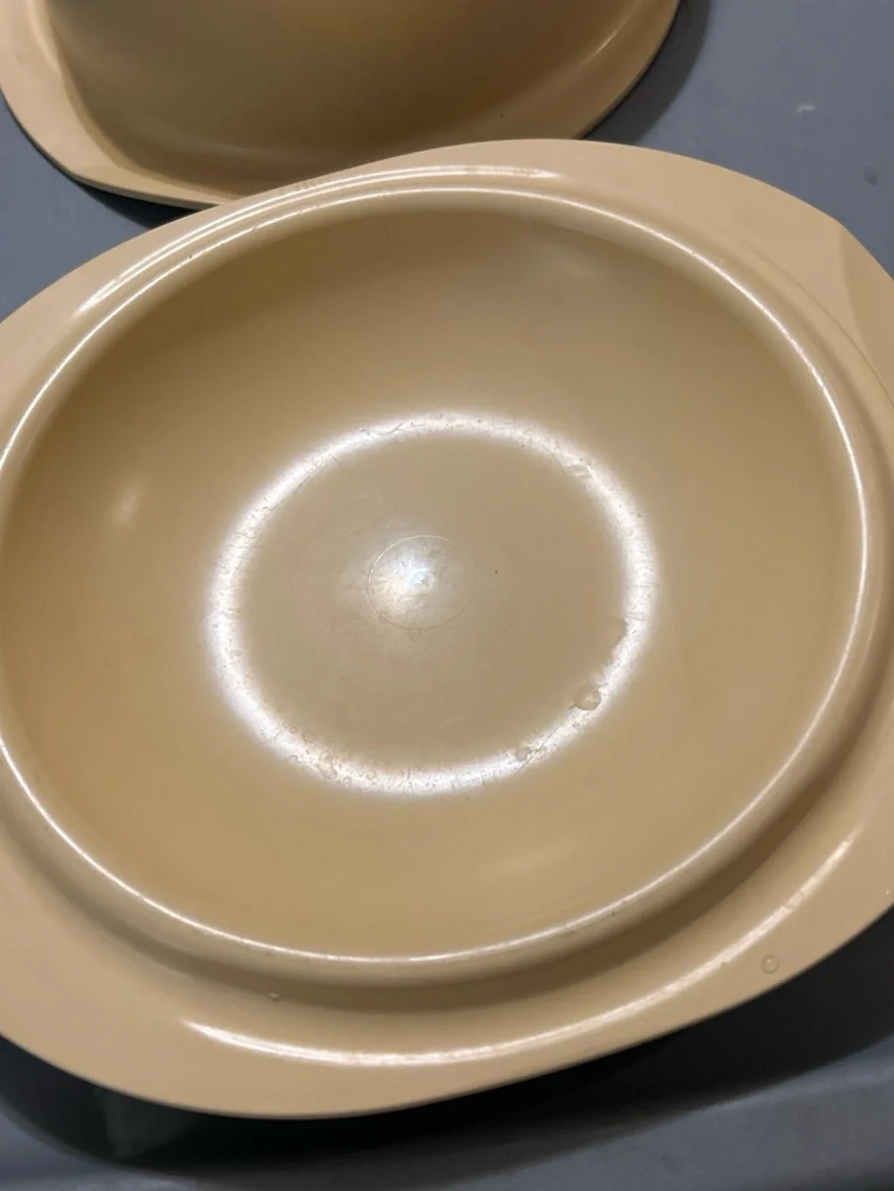 Tupperware very gently